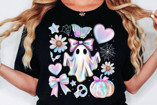 Black t-shirt with colorful ghost, bow, and floral design on a plain background